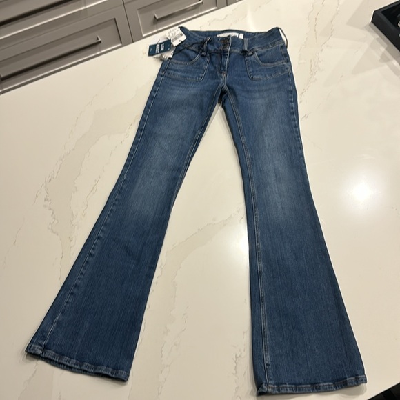 Subdued Low Waist Flare Jean With Front Square Pockets - Picture 6 of 13